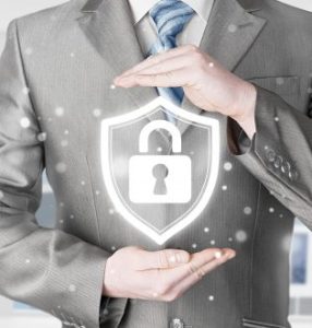 Man in suit holds image of padlock