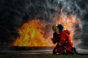 Fire fighters putting out fire