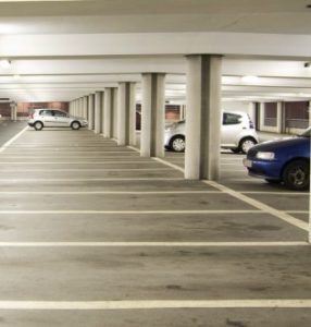 image of car park with three cars in it