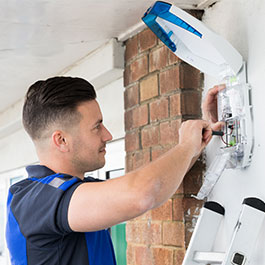 maintenance contractor works on access control unit
