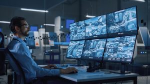 man monitoring screens with cctv