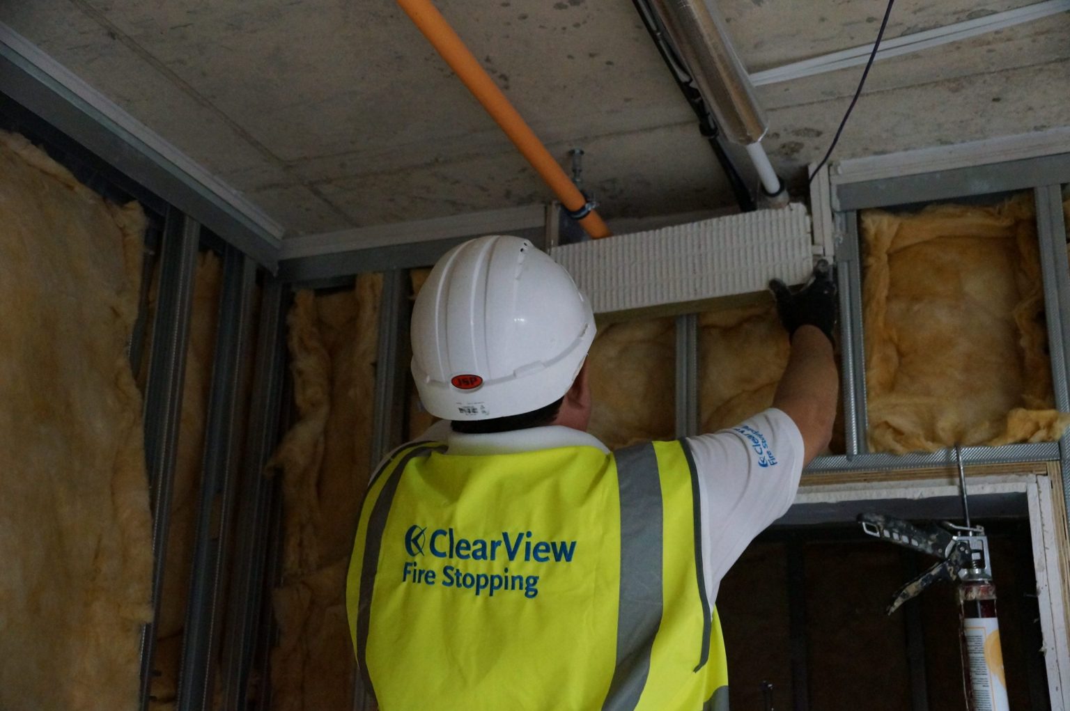 Fire stopping specialist working